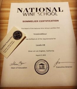 National Wine School sommelier certification and card.